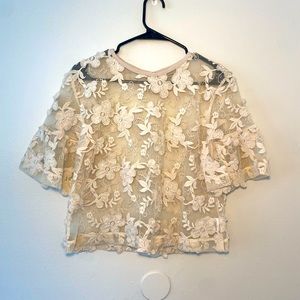 Sheer blouse with embroidered flowers
